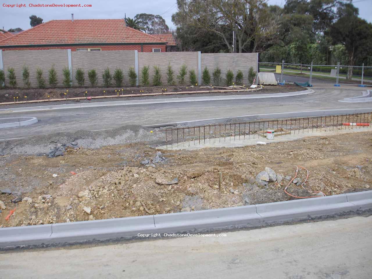 Metal stakes, ready for laying of privacy wall - Chadstone Development Discussions