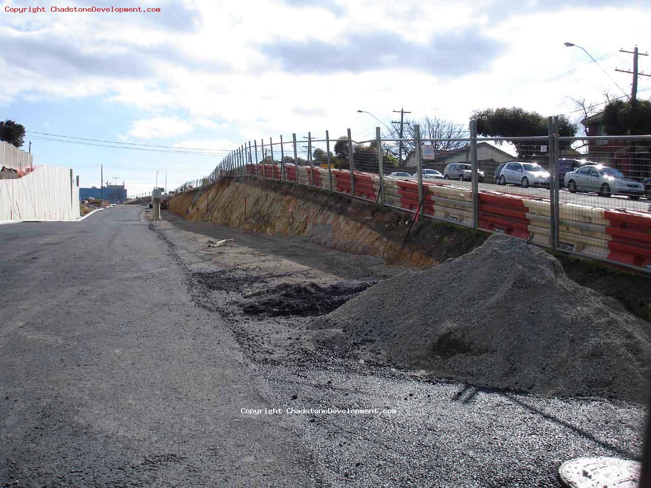 Pile of bitumen on unsealed part of new middle rd - Chadstone Development Discussions