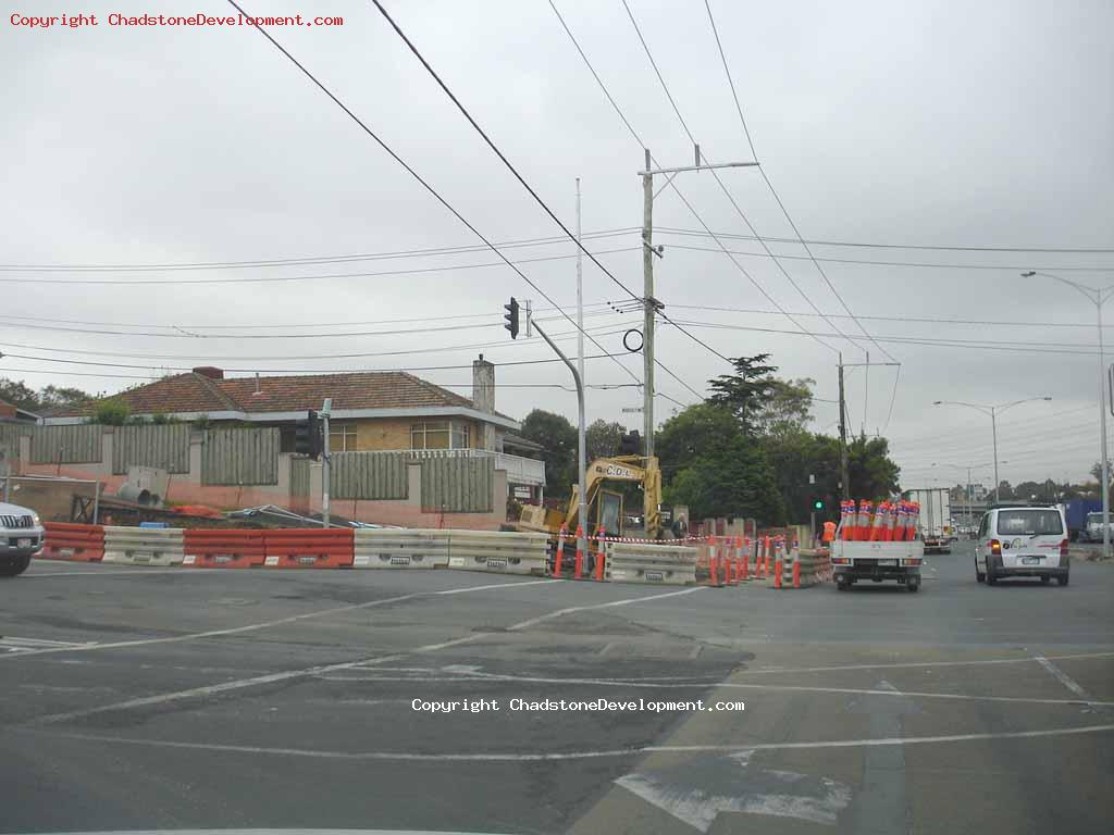 Laying cones on warrigal road in the morning - Chadstone Development Discussions