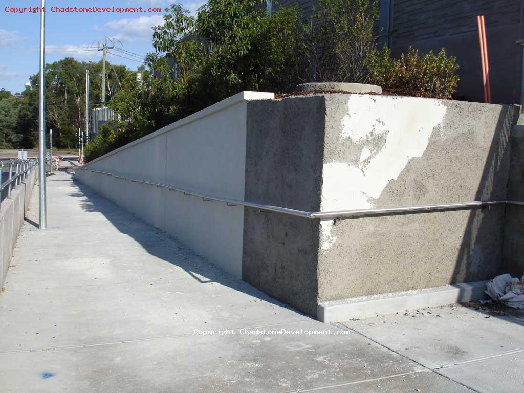 Half-rendered footpath wall - Chadstone Development Discussions