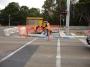 workers fixing the Warrigal Rd pedestrian crossing - Chadstone Development Discussions